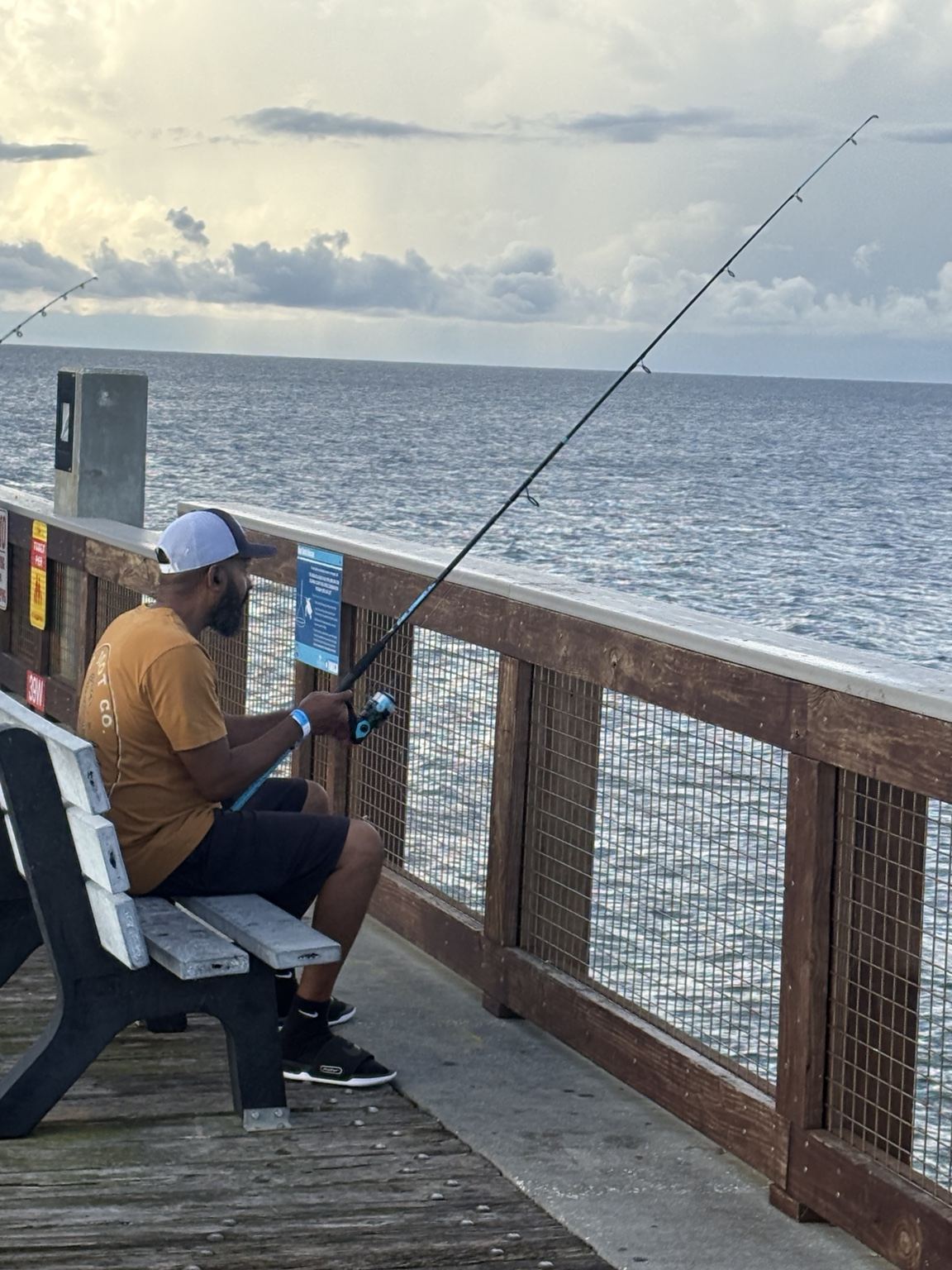 Family fishing from the pier