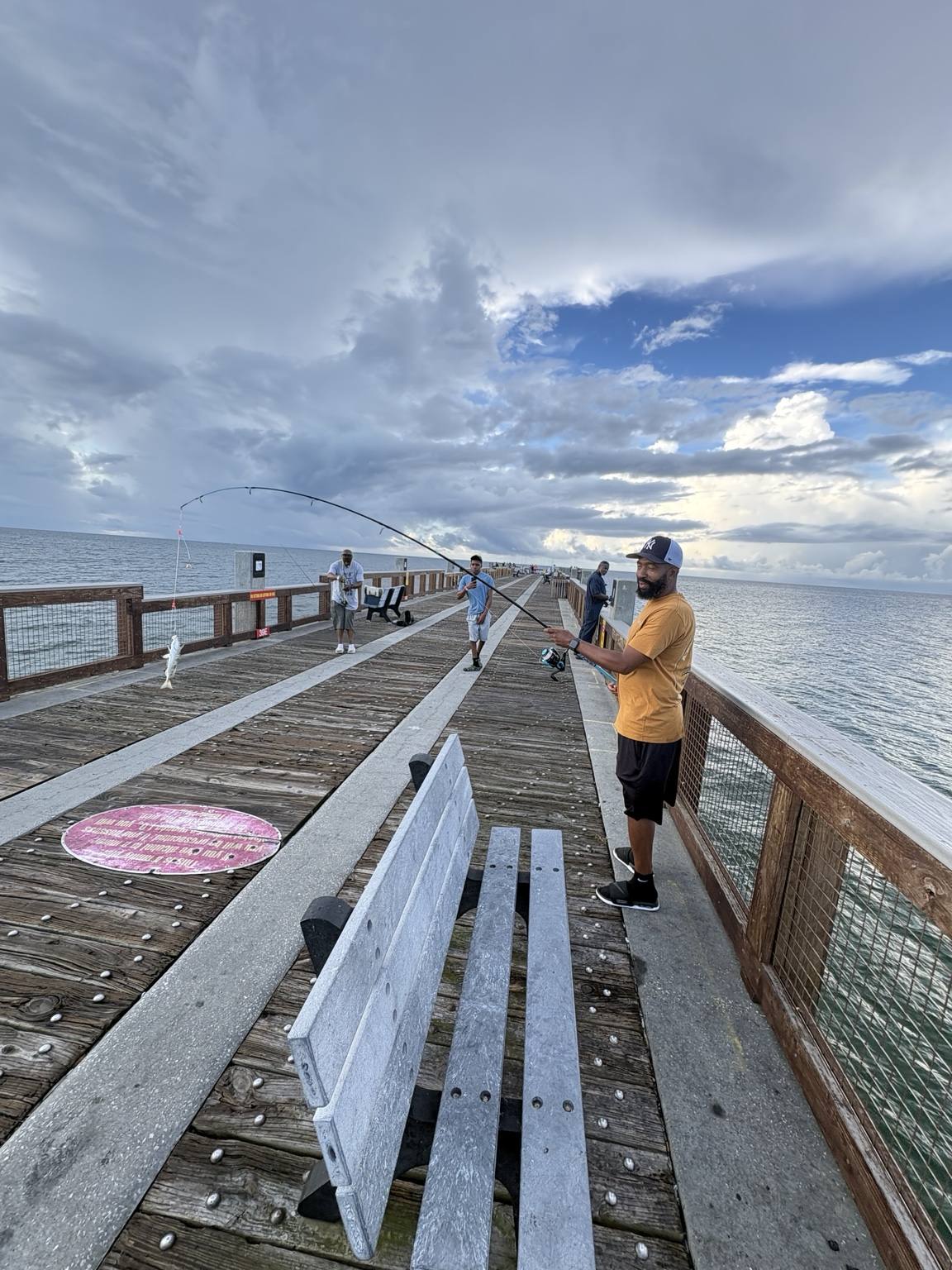 Fishing on the pier during the family reunion