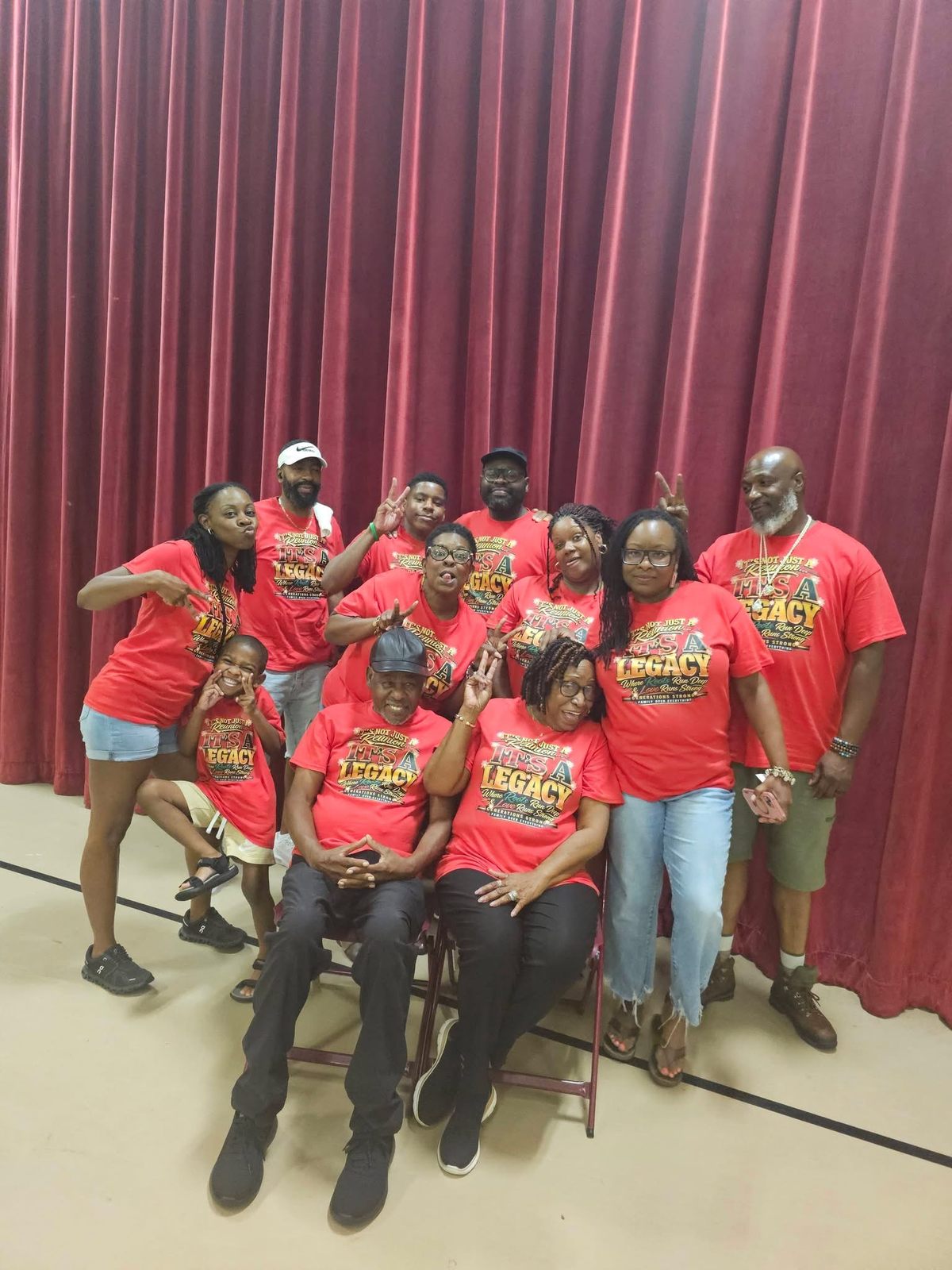 Family group wearing red reunion shirts